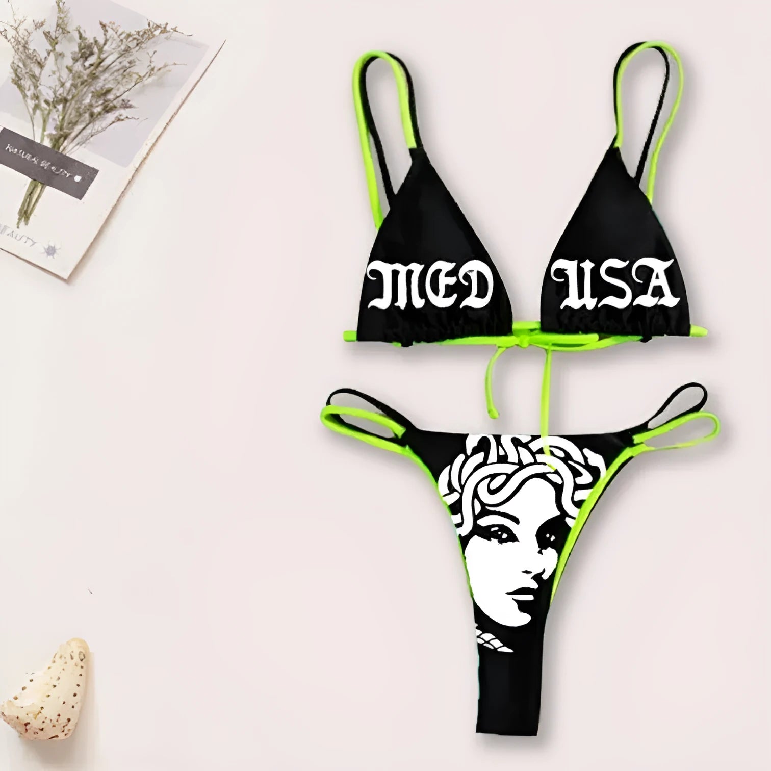 Women's black curve skull tube top bikini set with matching shorts, polyester fabric