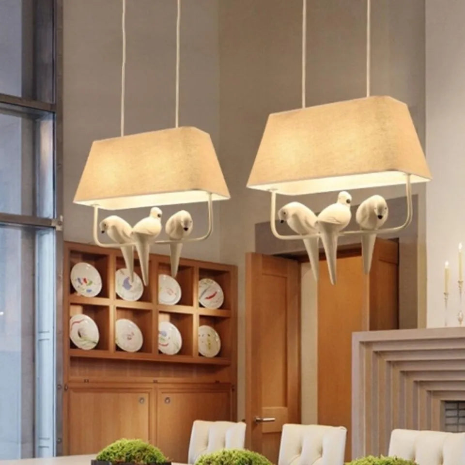 Iron and fabric bird chandelier ceiling lamp with decorative bird silhouette shade.