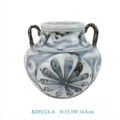 Hand-painted sunflower blue and white ceramic vase on a wooden table