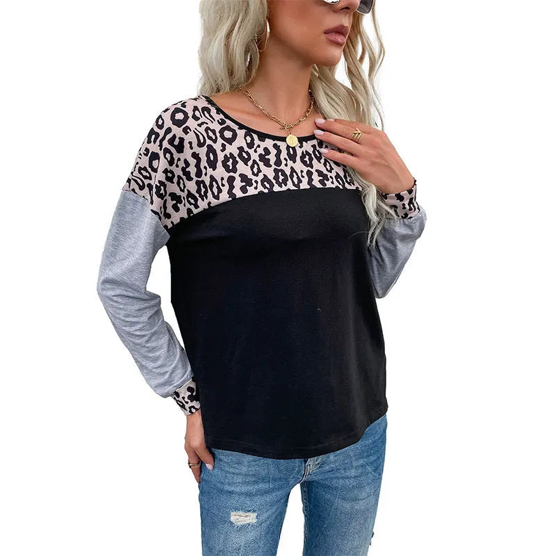 Women's black leopard print patchwork loose fit pullover sweater with round neck and long sleeves
