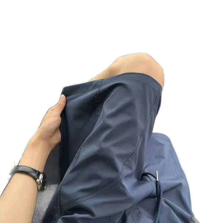 Men's quick-drying polyester sports shorts with slant pockets in black colour