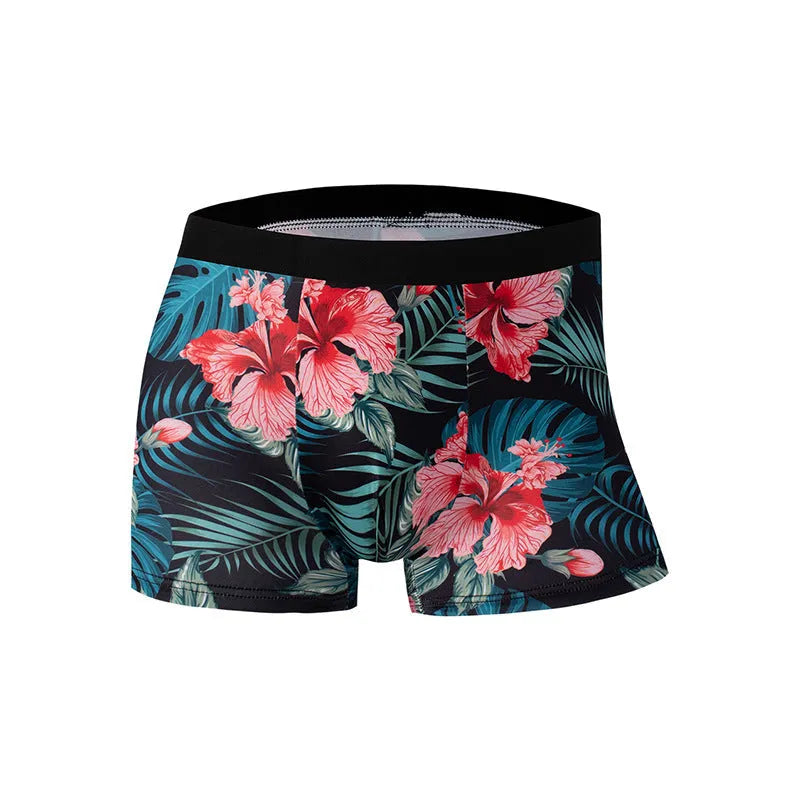Men's printed ice silk boxer shorts showing floral pattern on breathable polyester fabric with mid waist design.