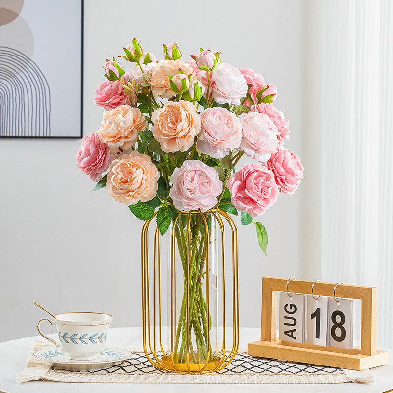 Fake flower decoration silk bouquet in eight mixed colours on a living room shelf