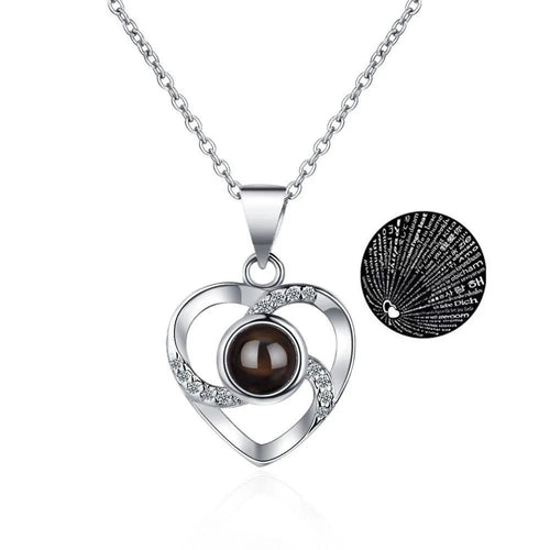 Rose gold copper heart-shaped projection necklace with O chain shows I Love You in 100 languages