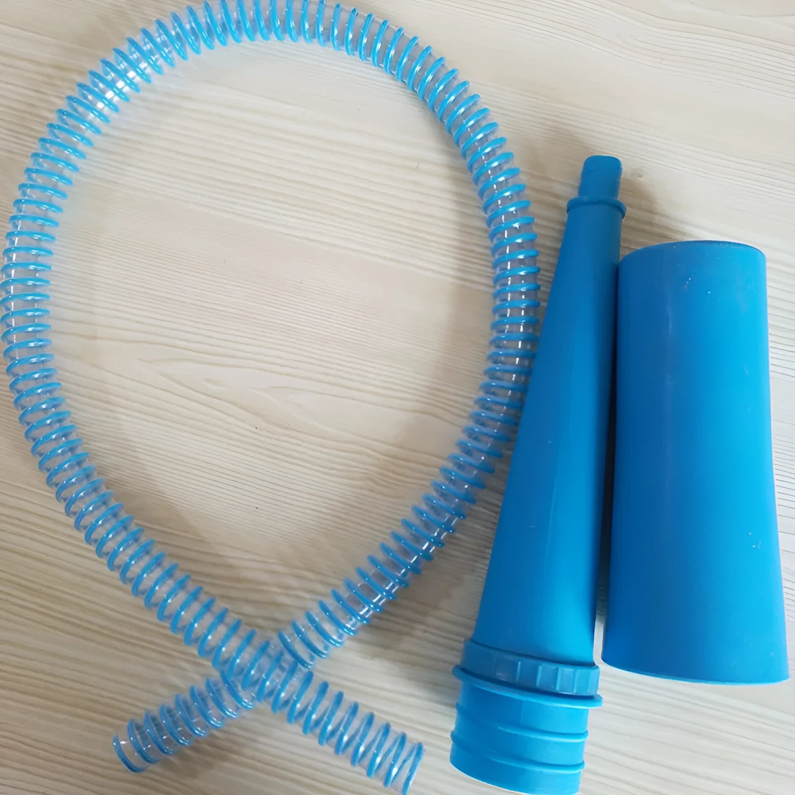 Blue suction pipe vacuum cleaner attachment with round head, 114cm length and three opposing bags for washing machine cleaning