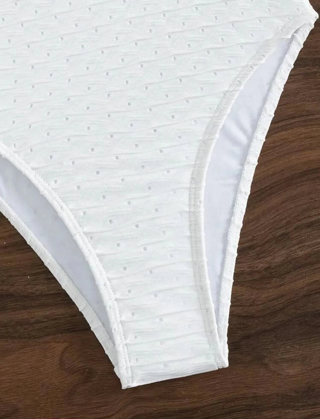 White women's one-piece swimsuit with sling brief style and quick-drying polyester fabric