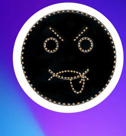 Black car rear window LED expression light showing smiley face pattern with orange LED beads