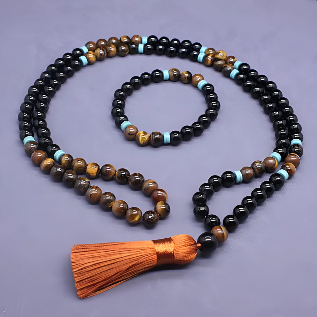 Black agate bracelet and matching necklace with a Tiger pattern stone pendant.