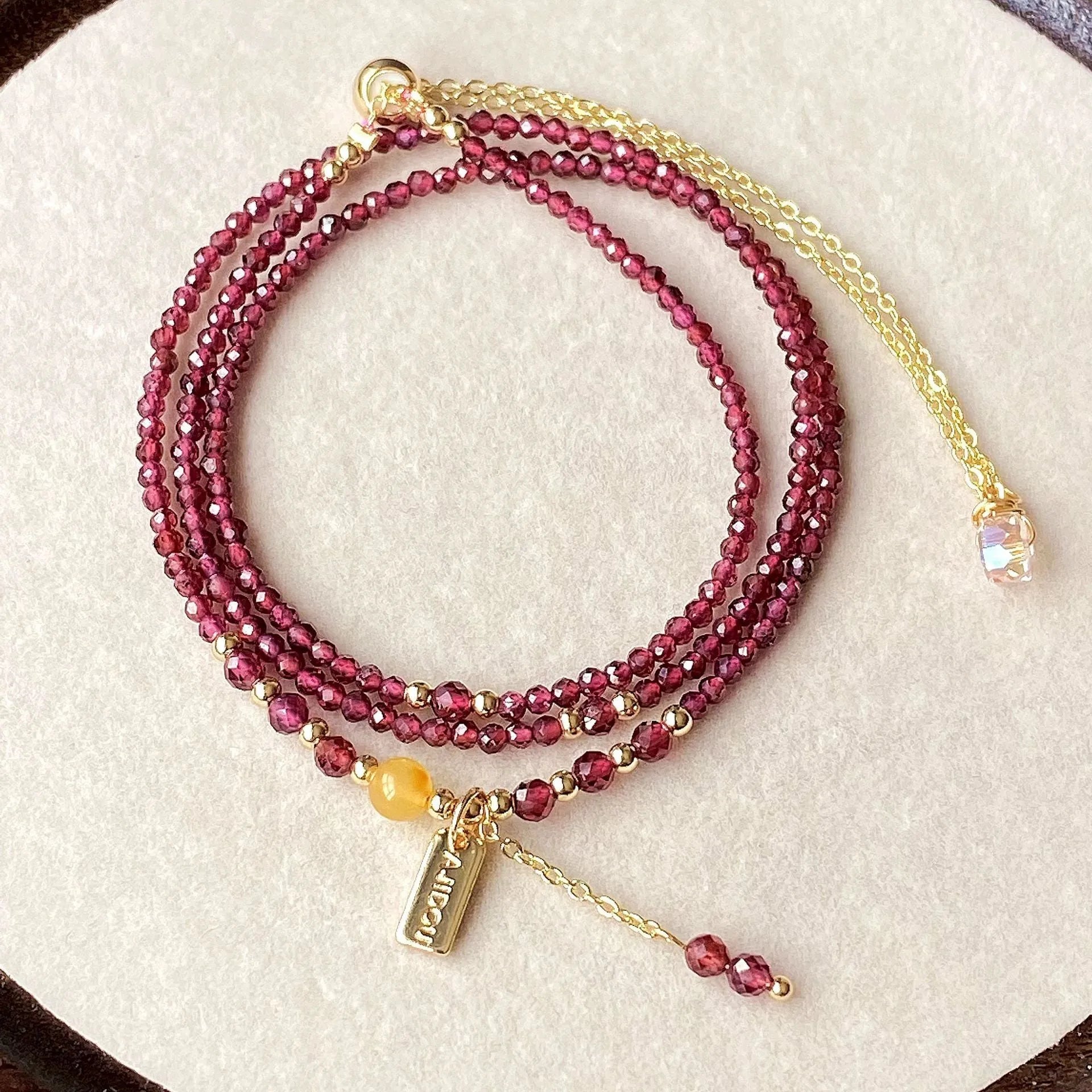 Garnet wine red bracelet and necklace set with beeswax cut surface and three-circle design