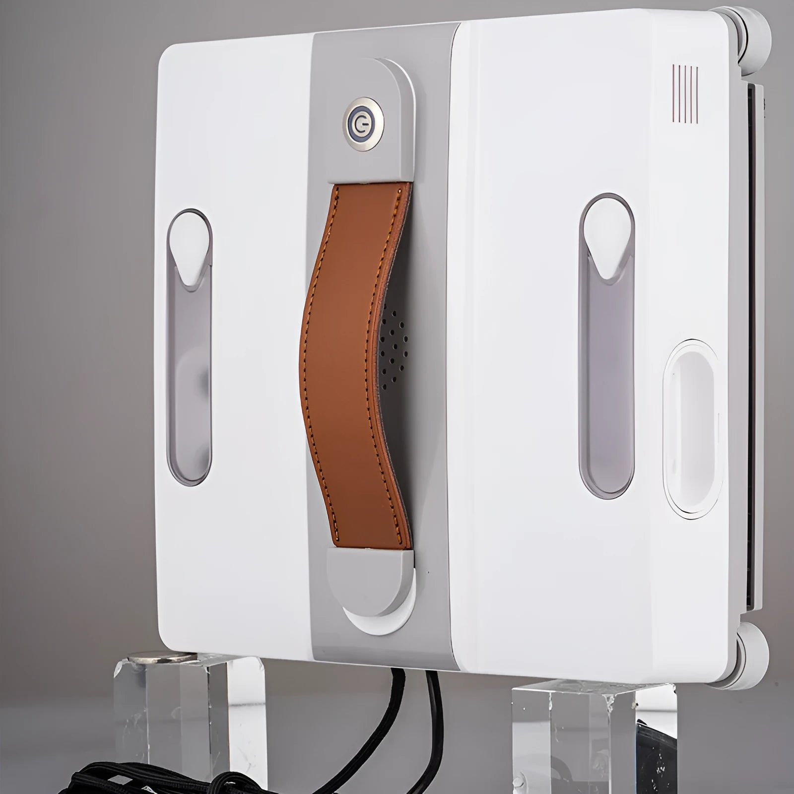 White intelligent window cleaning robot for automated washing of high-rise windows.