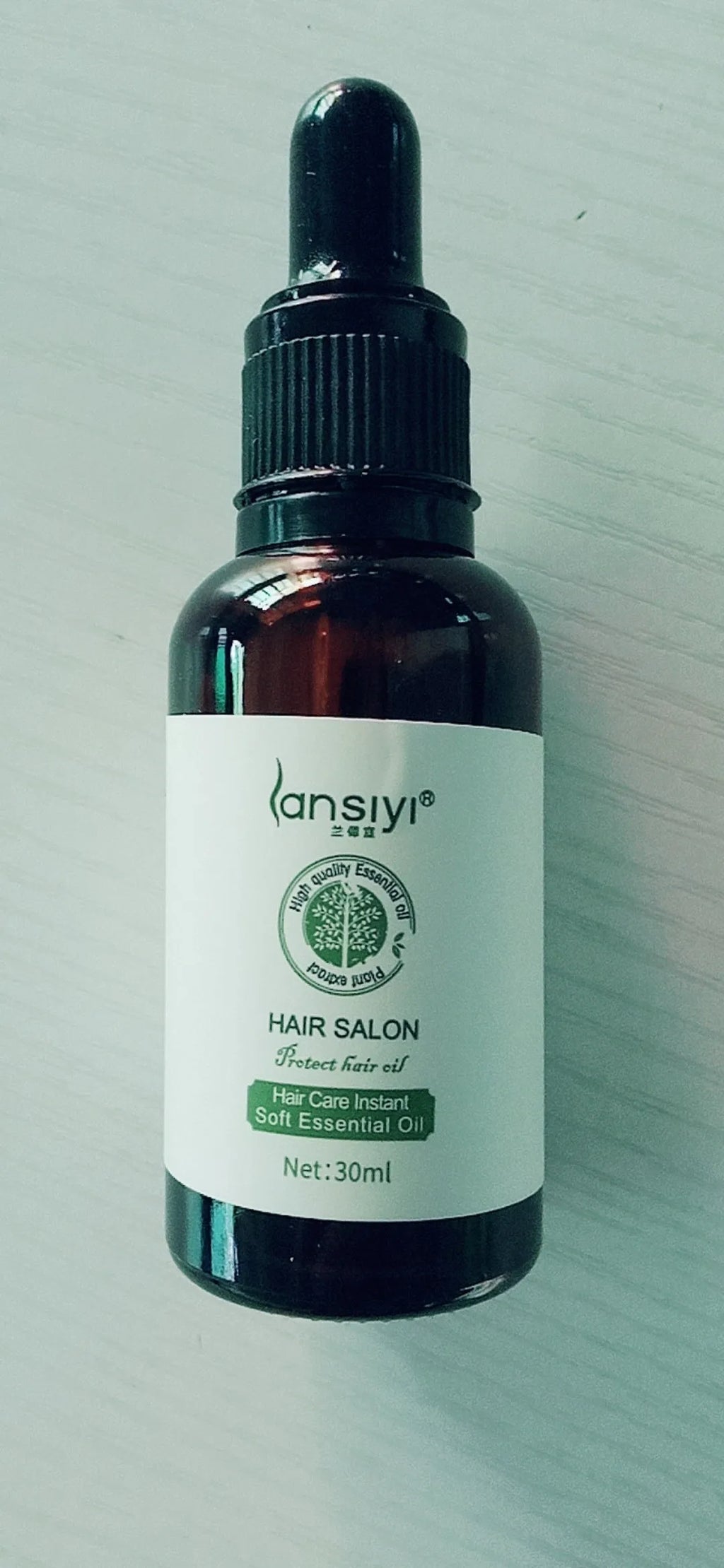 Hair Care Essential Oil 30ml bottle for moisturising dry hair and scalp