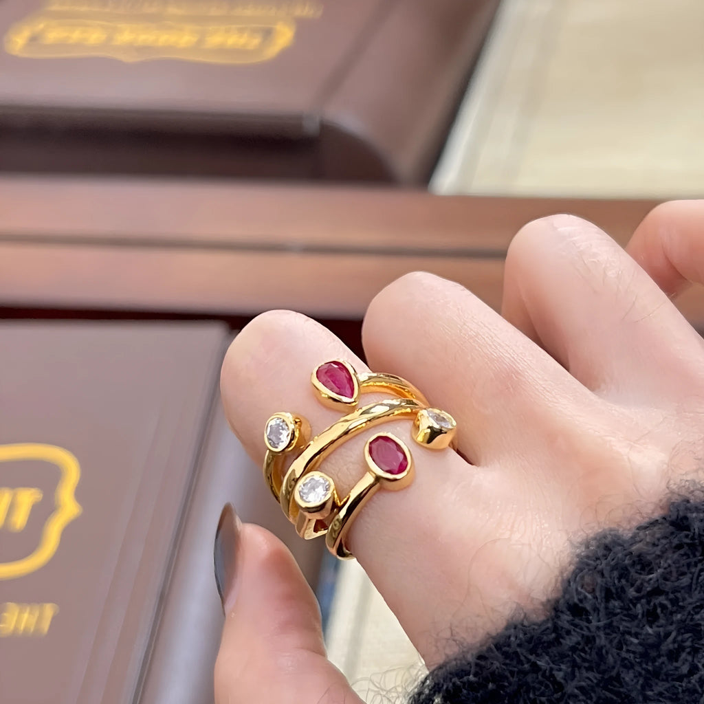 Copper retro geometric ring with irregular cross design and two-tone colour options.