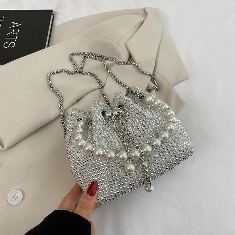 Soft PU leather crossbody bag with diamond pattern and bucket design in multiple colour options