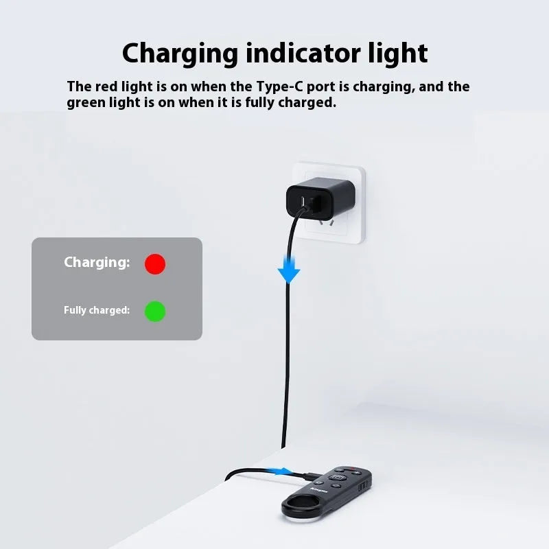 Mobile phone Bluetooth remote control tripod with handle in black ABS material on flat surface