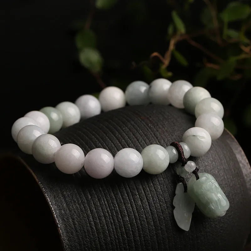 Natural green jade bracelet with geometric pendant featuring Maitreya Buddha design for women.