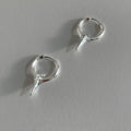 Women's geometric star-shaped clip earrings with a platinum electroplated finish on copper.