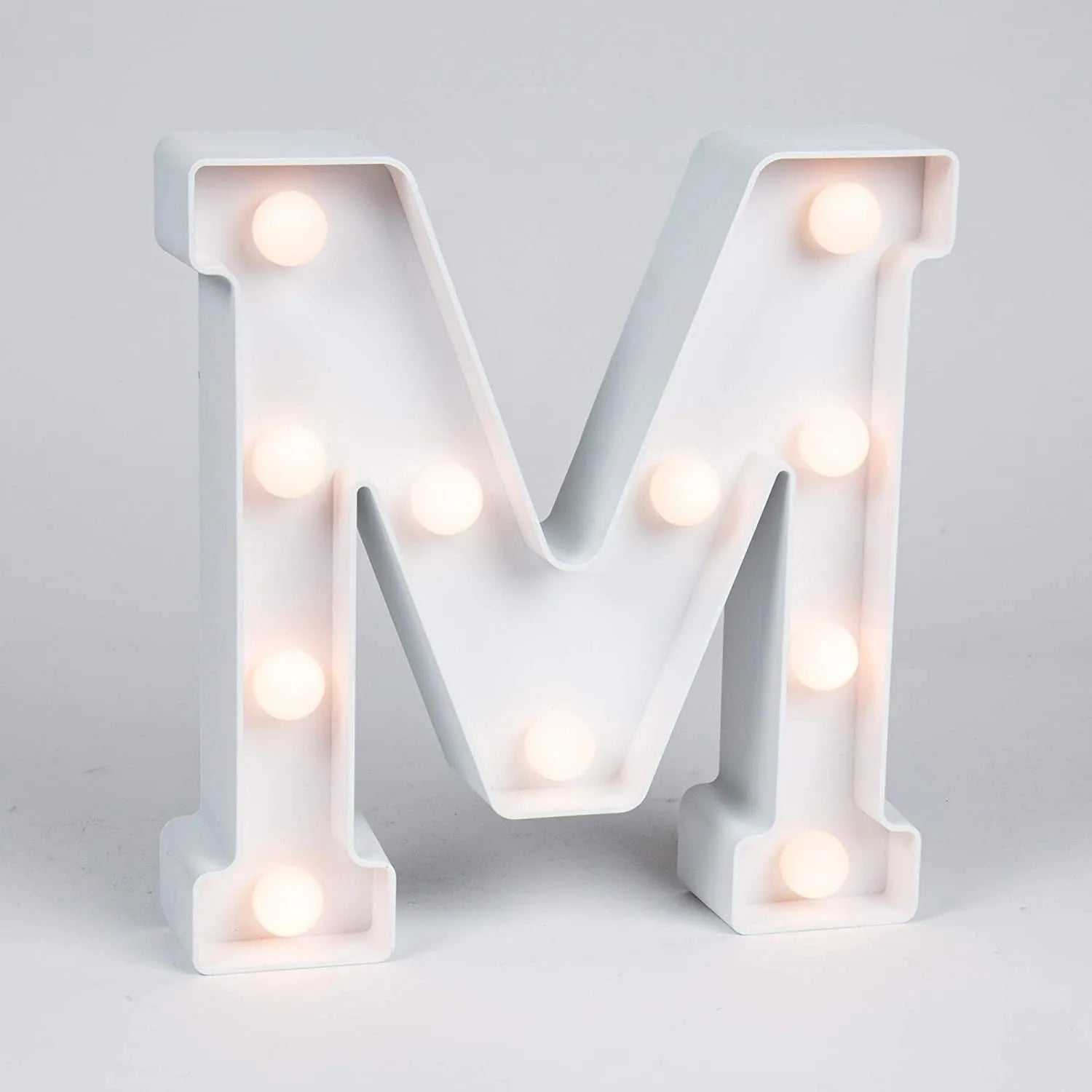 White plastic LED marquee letter sign with warm white glow, 22cm tall