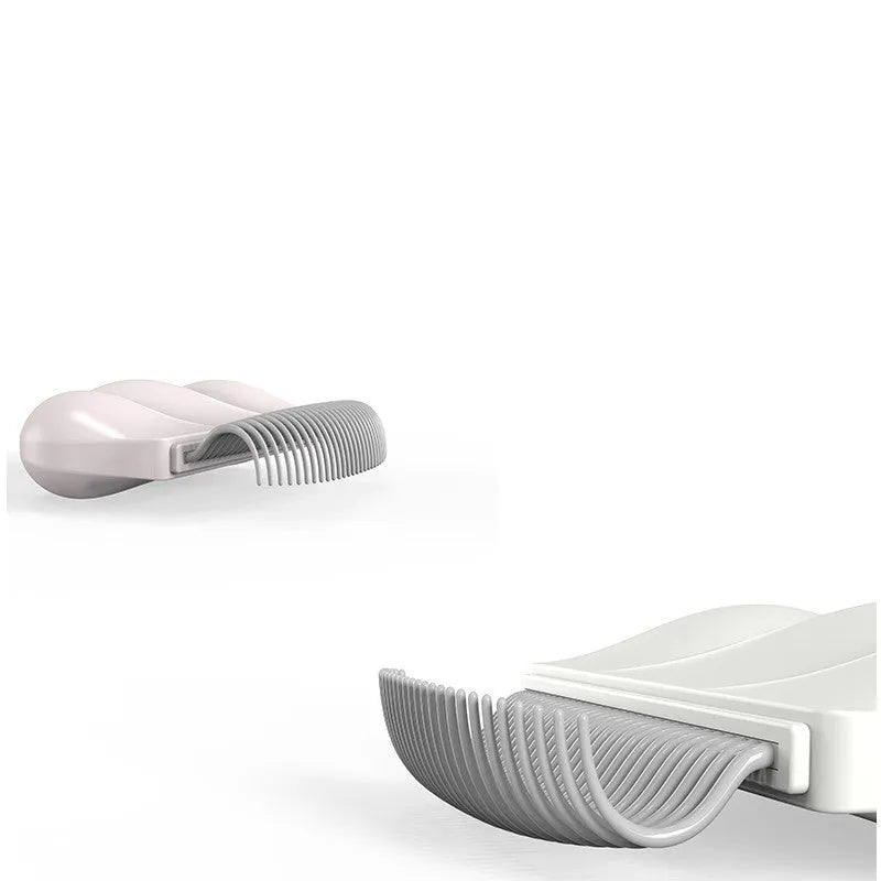 Paw soft deshedding brush for cats and dogs with rectangular blue head and silicone grip.