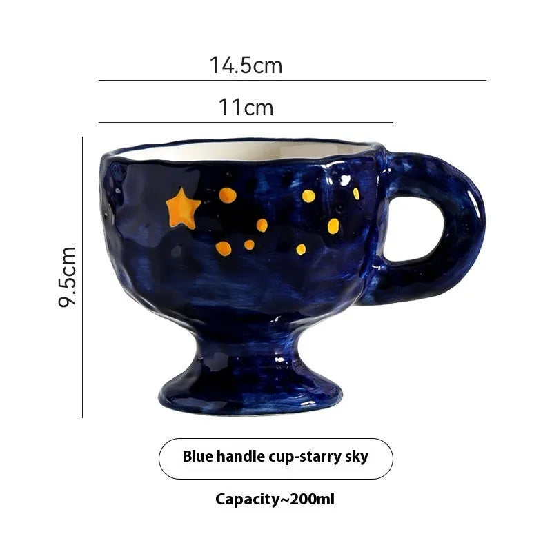 Hand-pinched irregular shaped ceramic mug in a solid colour on a plain background.