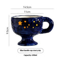 Hand-pinched irregular shaped ceramic mug in a solid colour on a plain background.