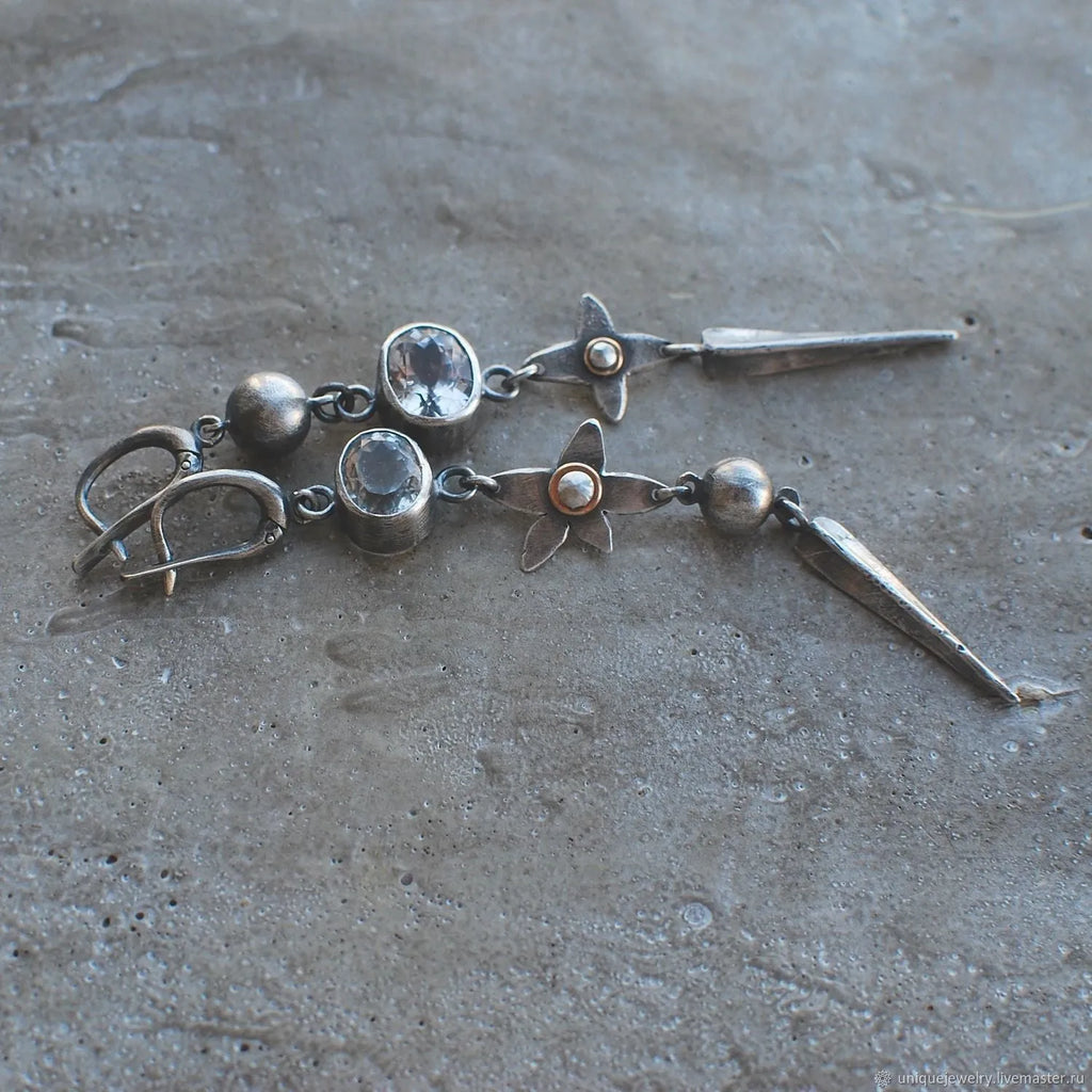 Geometric pendant drop earrings with antique silver finish and rhinestone detailing
