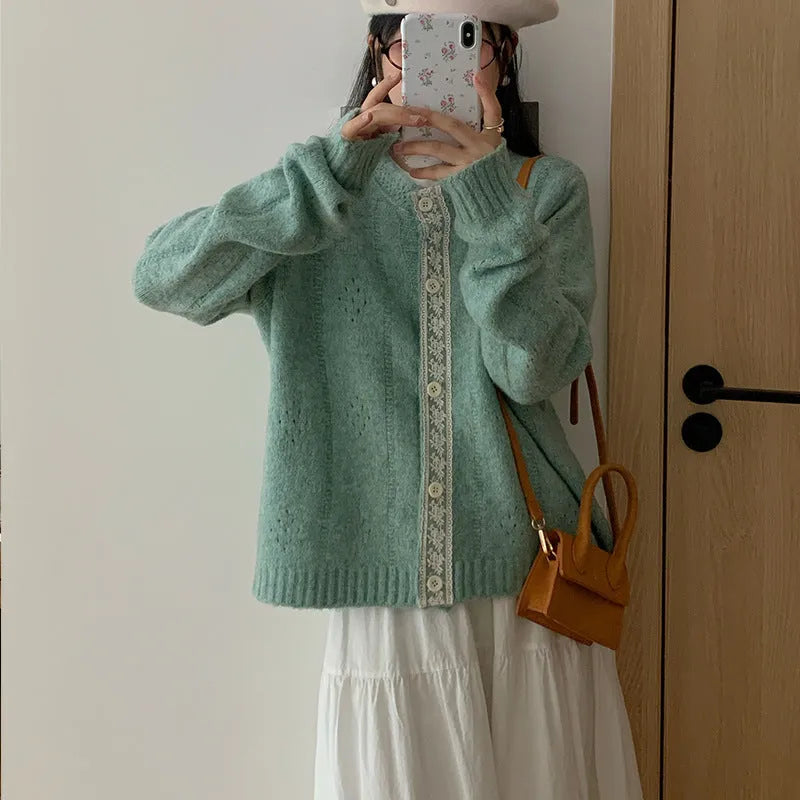 Artistic retro loose-fit sweater coat cardigan in apricot, shown on a model.
