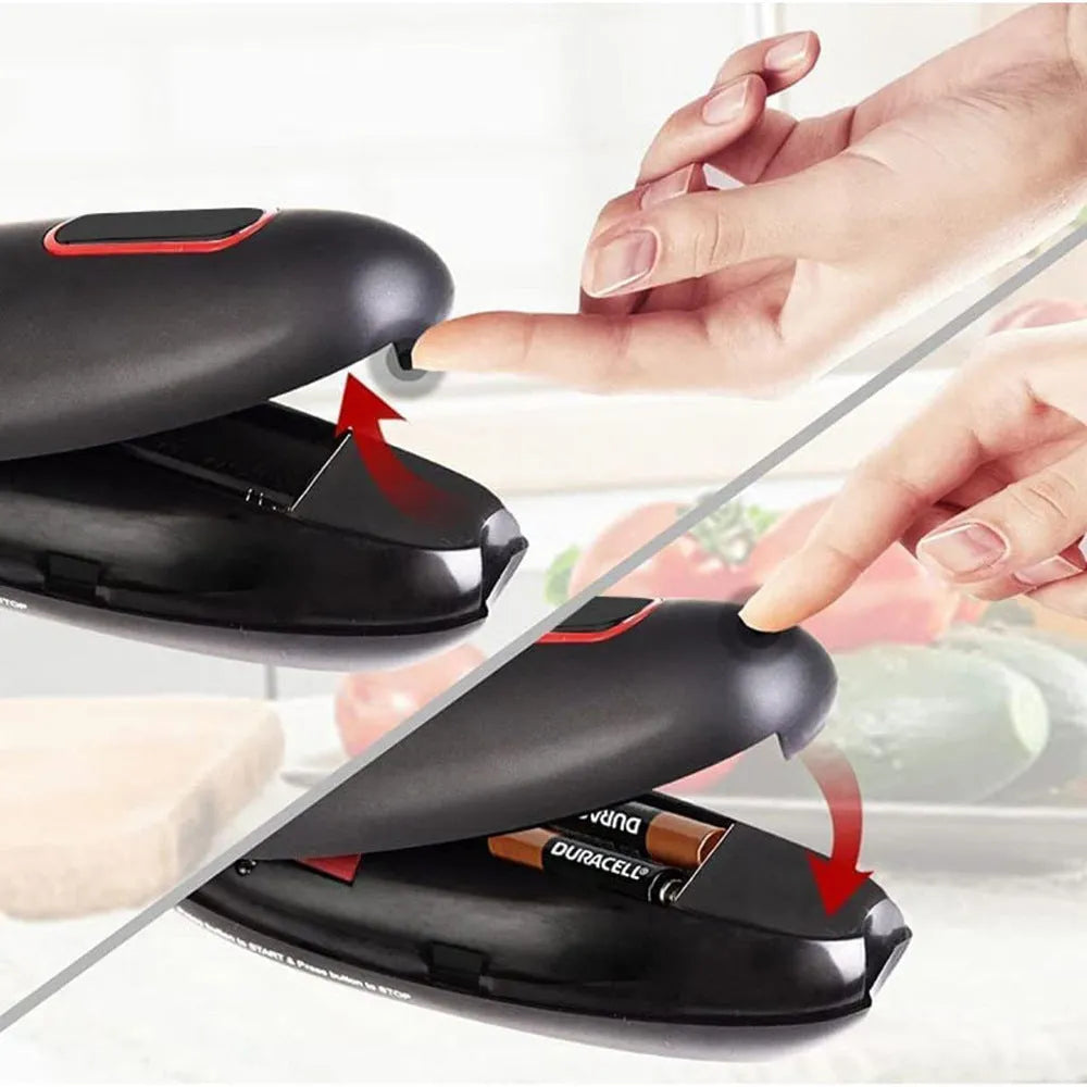 Electric can opener in black plastic on a kitchen counter