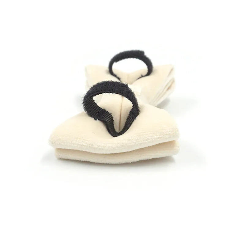Cream velvet dog collar with gold buckle, matching bow tie, and leash set on a white background