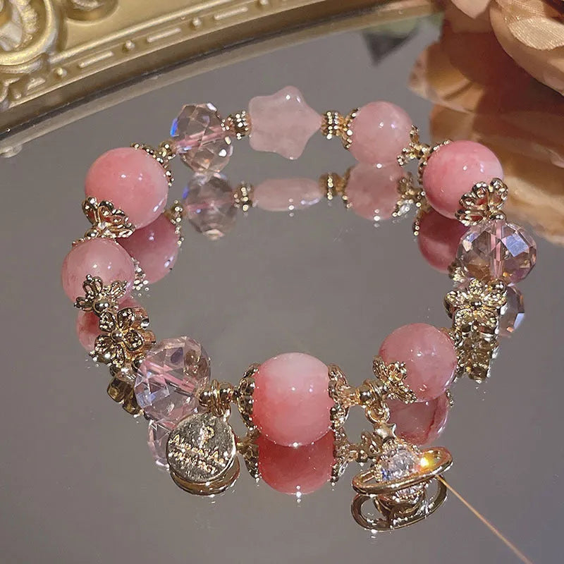 Women's galaxy colour bracelet with snowflake pendant and bow design on heart-shaped alloy base