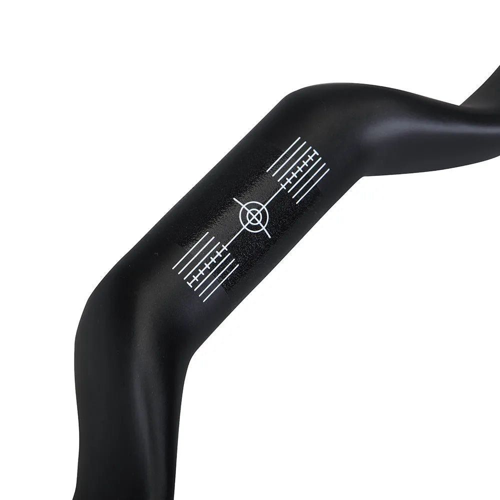 Black carbon fibre bicycle handlebar showing bent shape, with 31.8mm clamp area.