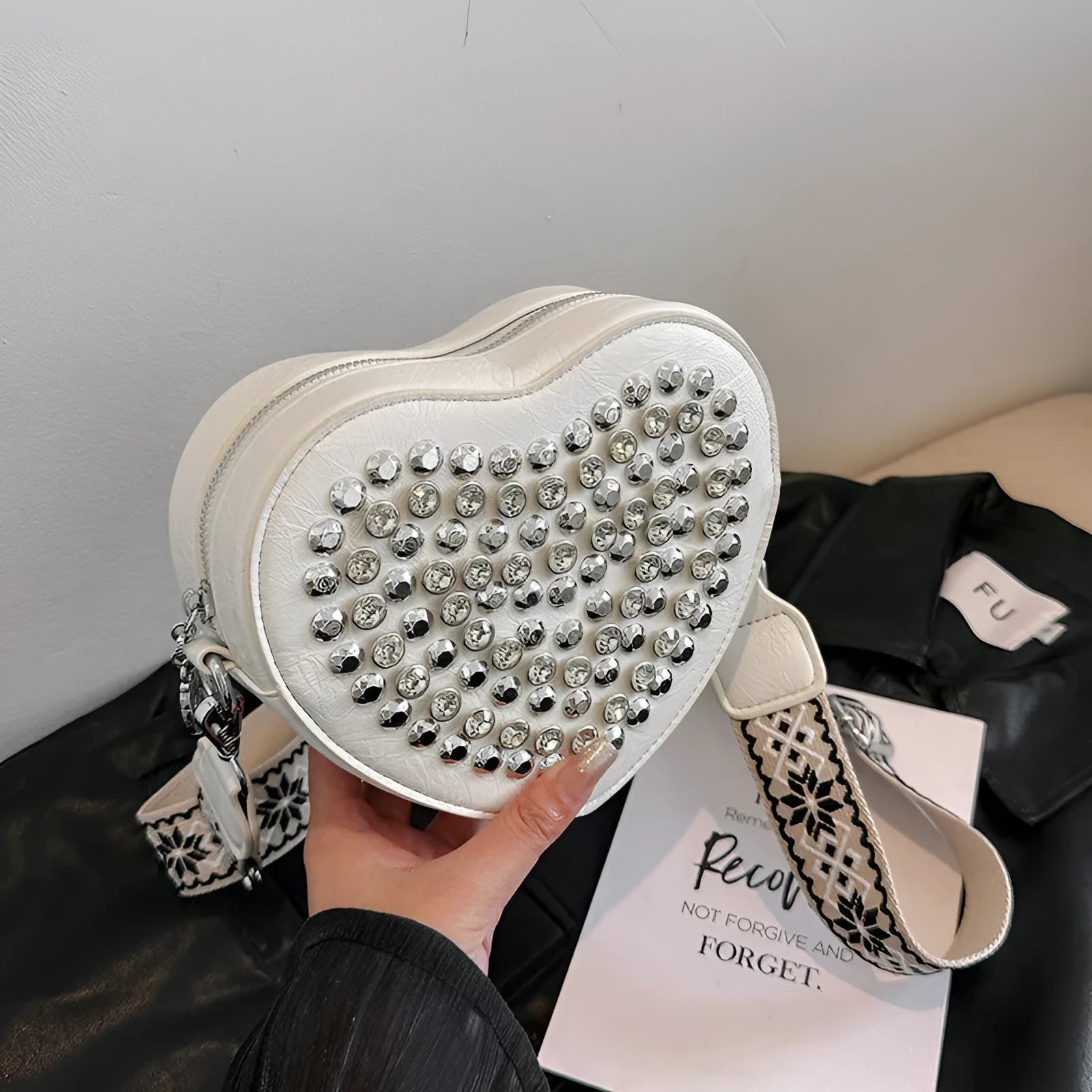 Heart shaped PU crossbody phone bag with western style shoulder strap in black