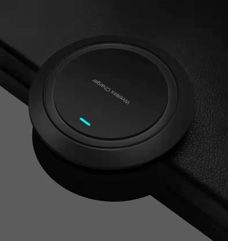 Circular white desktop wireless phone charger showing 10W fast charging capability and 7mm thickness