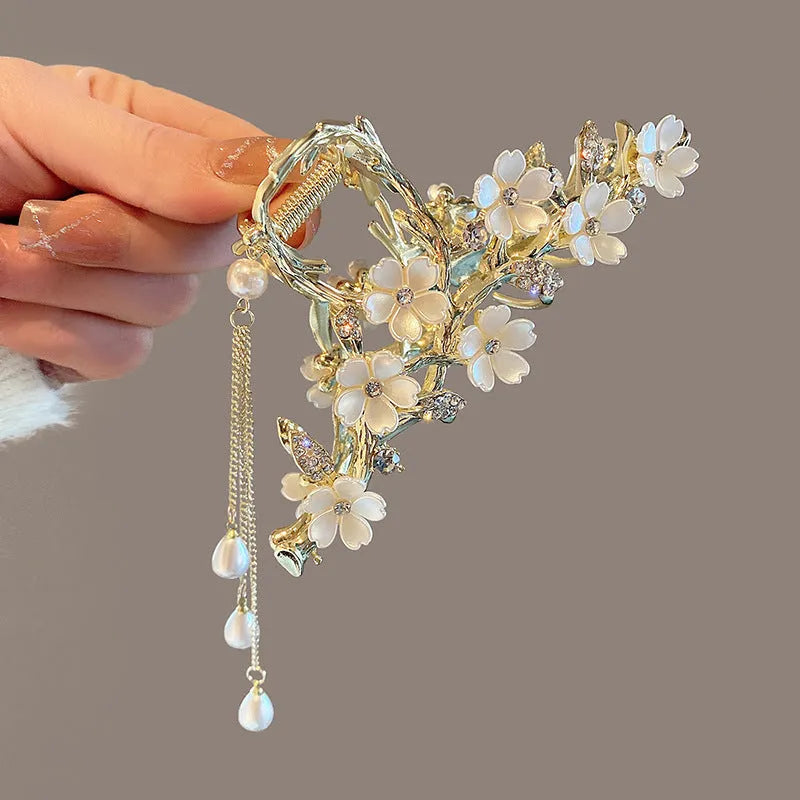 Large metal hair clip with pearl and diamond inlay, bell orchid tassel pendant, approximately 11.5cm length