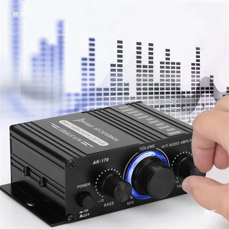 Mini small amplifier black 20W stereo with RCA input and cable clip outputs for home computer audio