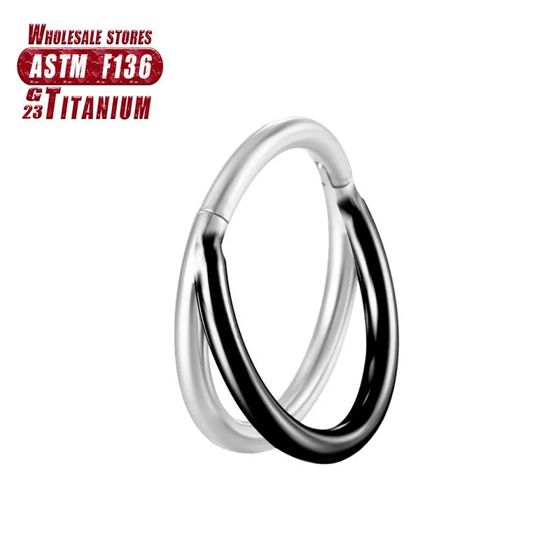 Close-up of a titanium alloy fork nose ring on a plain background, showing the straight post and bent back design.