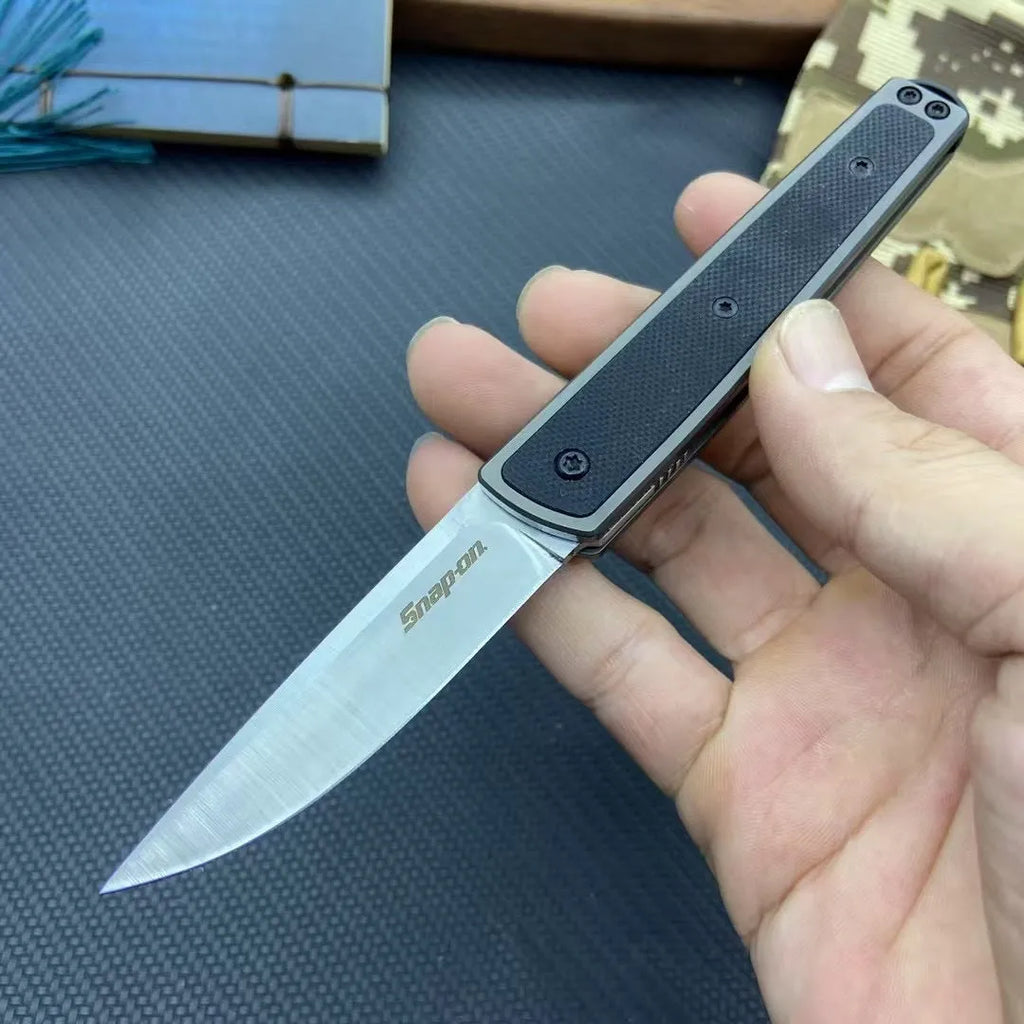 Handmade folding fruit knife with stainless steel blade shown open, in black, red, or brown colour options.