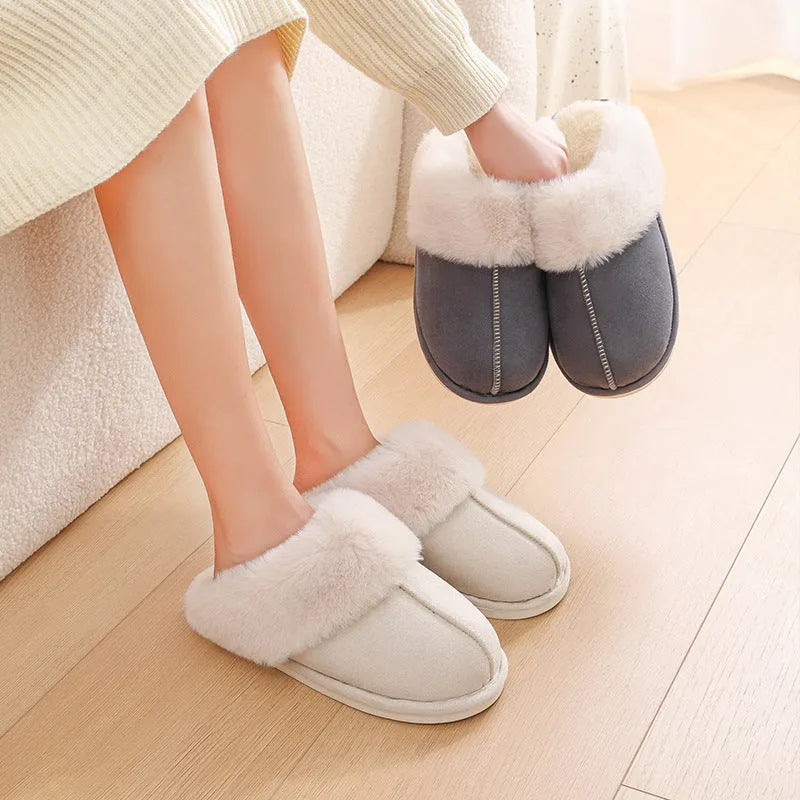 Women's brown plush indoor slippers with a round toe, flat heel, and a textured PVC sole.