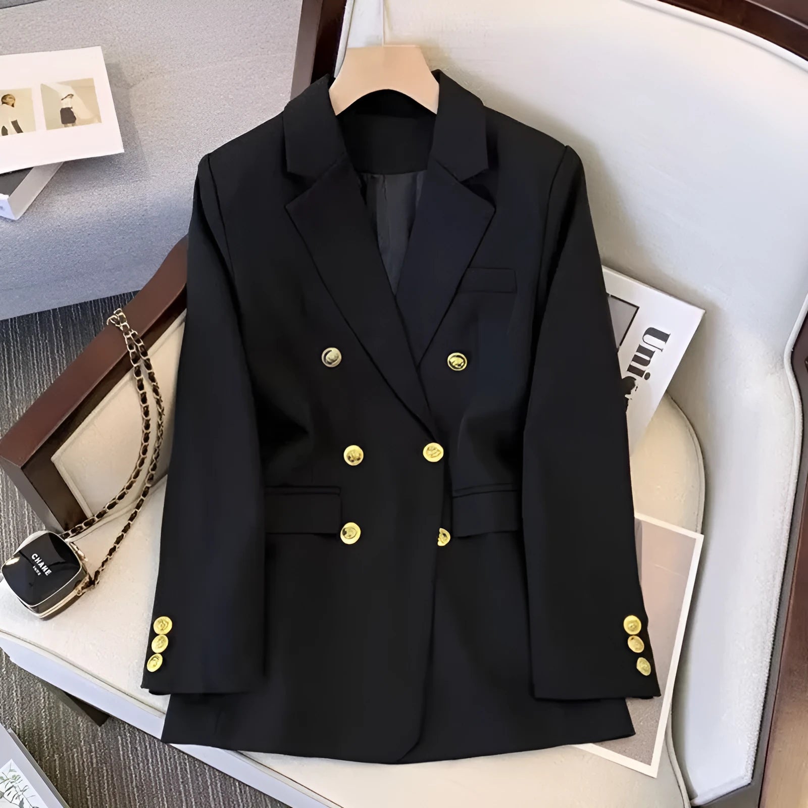 Women's loose fit polyester blouse in black with regular sleeves and 50cm length