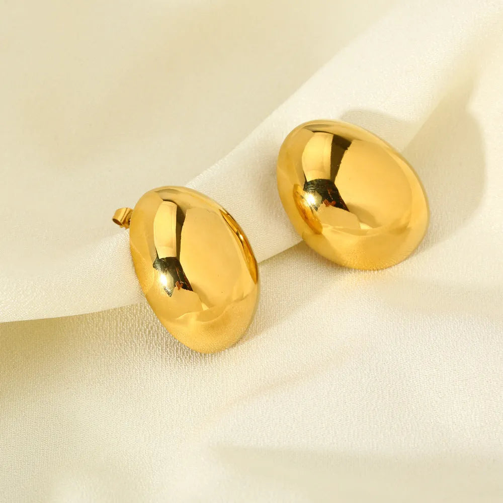 Geometric line earrings in stainless steel with 18K gold electroplated finish and glazed surface