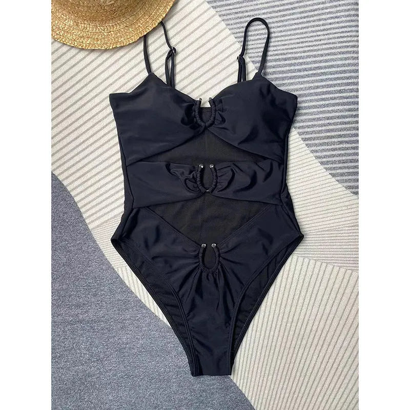 Black women's one-piece bikini-style swimsuit on a mannequin