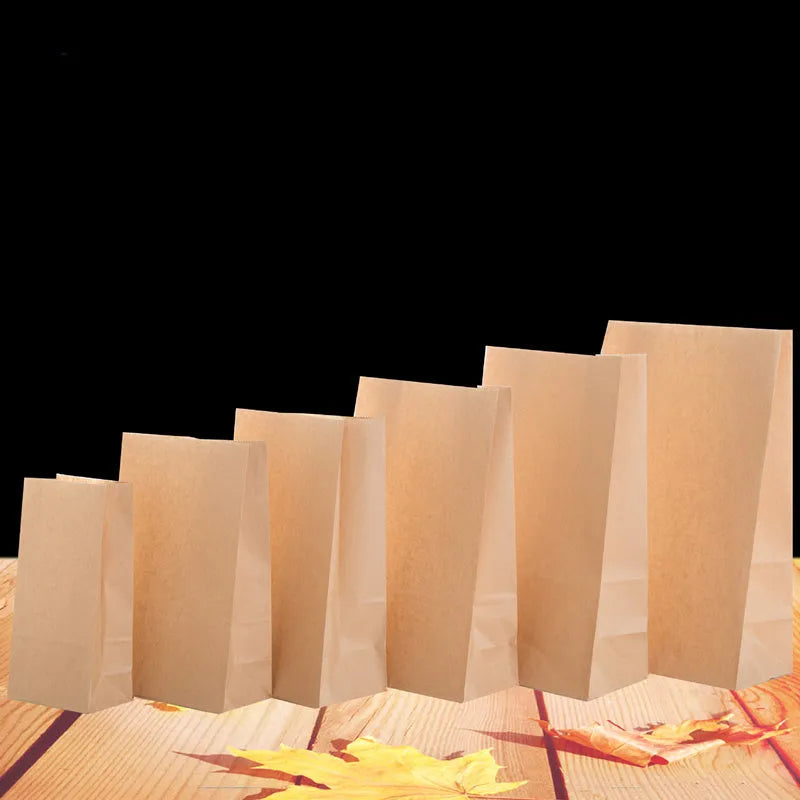 Yellow thickened kraft paper inner packaging bag with aluminium foil lining for snacks.