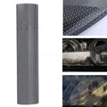 Large sheet of perforated mesh-style automotive vinyl film for car body colour modification.