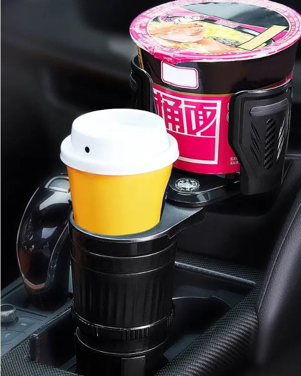 Black adjustable car cup holder with retractable base on a grey background.