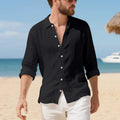 Man wearing a loose-fit light blue linen casual shirt with button-down front, showcasing its relaxed American style.
