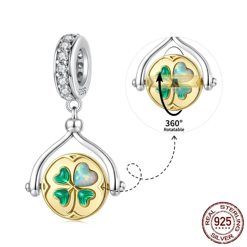 925 silver rotating card pendant with four-leaf clover pattern and wings motif on white background
