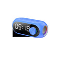 S8 Black portable USB mini clock radio with extra bass on a table.