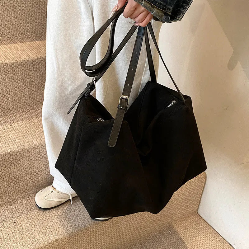 Women's large capacity suede pillow shoulder bag in PU leather, black colour, with outer slit pocket