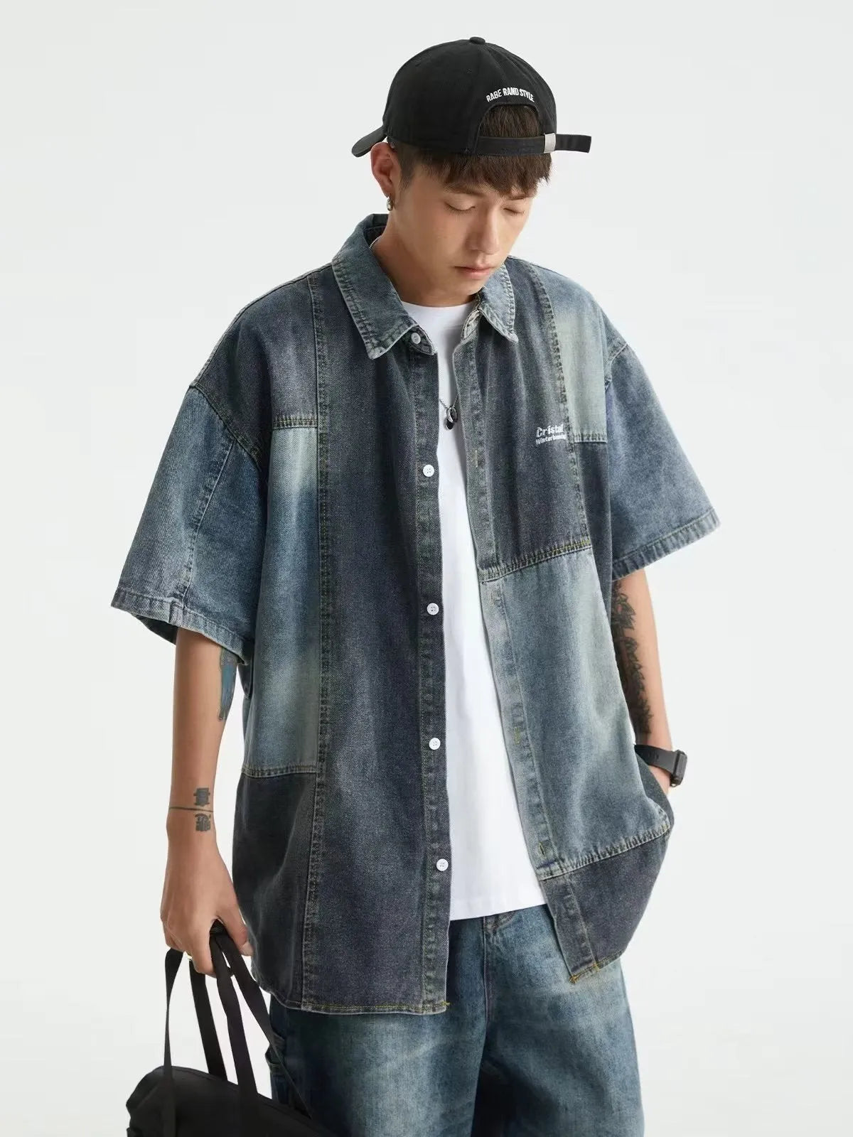 Blue men's loose-fit denim shirt with Japanese retro washed stitching, shown open in a cardigan style.