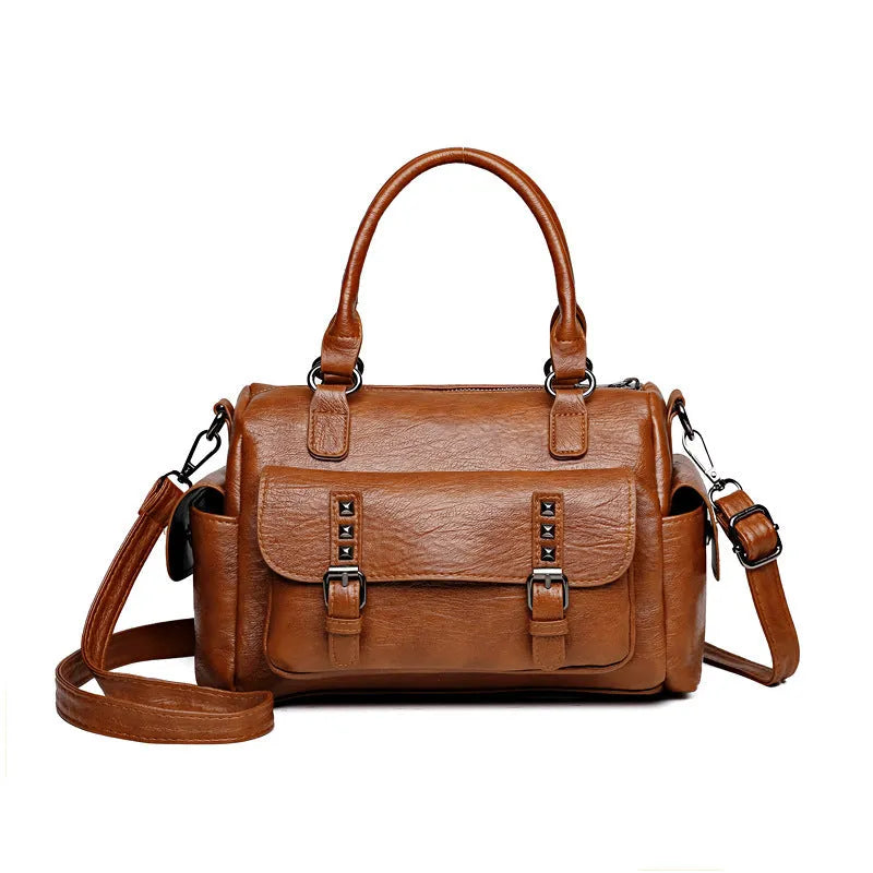 Vintage-style messenger bag in horizontal square shape with contrast stitching, shown in available colour options