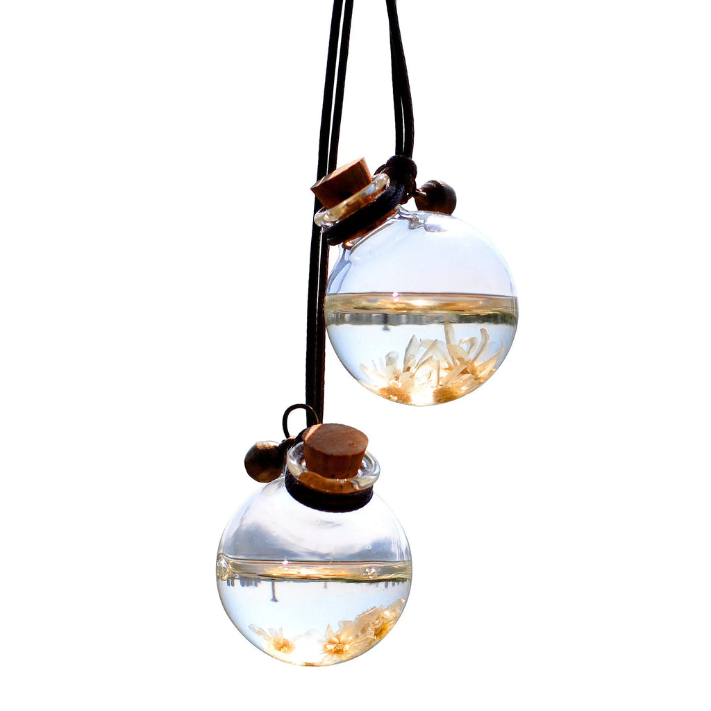 Glass car perfume pendant in fire extinguisher shape with light pink hydrangea preserved flower inside